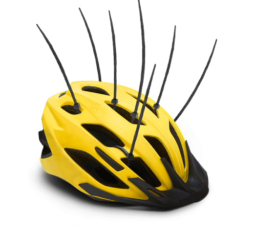 Yellow bike helmet with cable ties sticking out